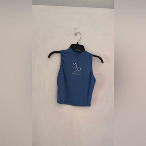 Capricorn, blue mock neck tank